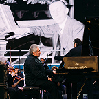 В. Руденко и Д. Юровский в присутствии Рахманинова